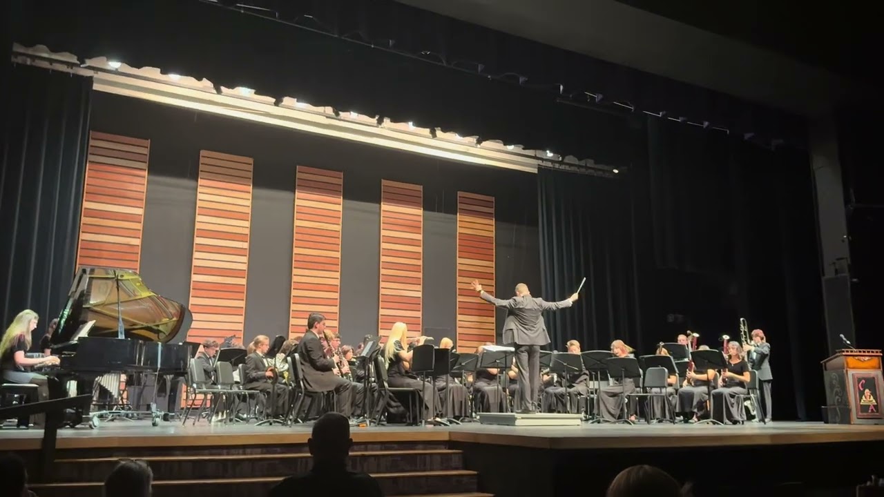 Jw Mitchell high school wind ensemble plays Lux perpetua at pre mpa 