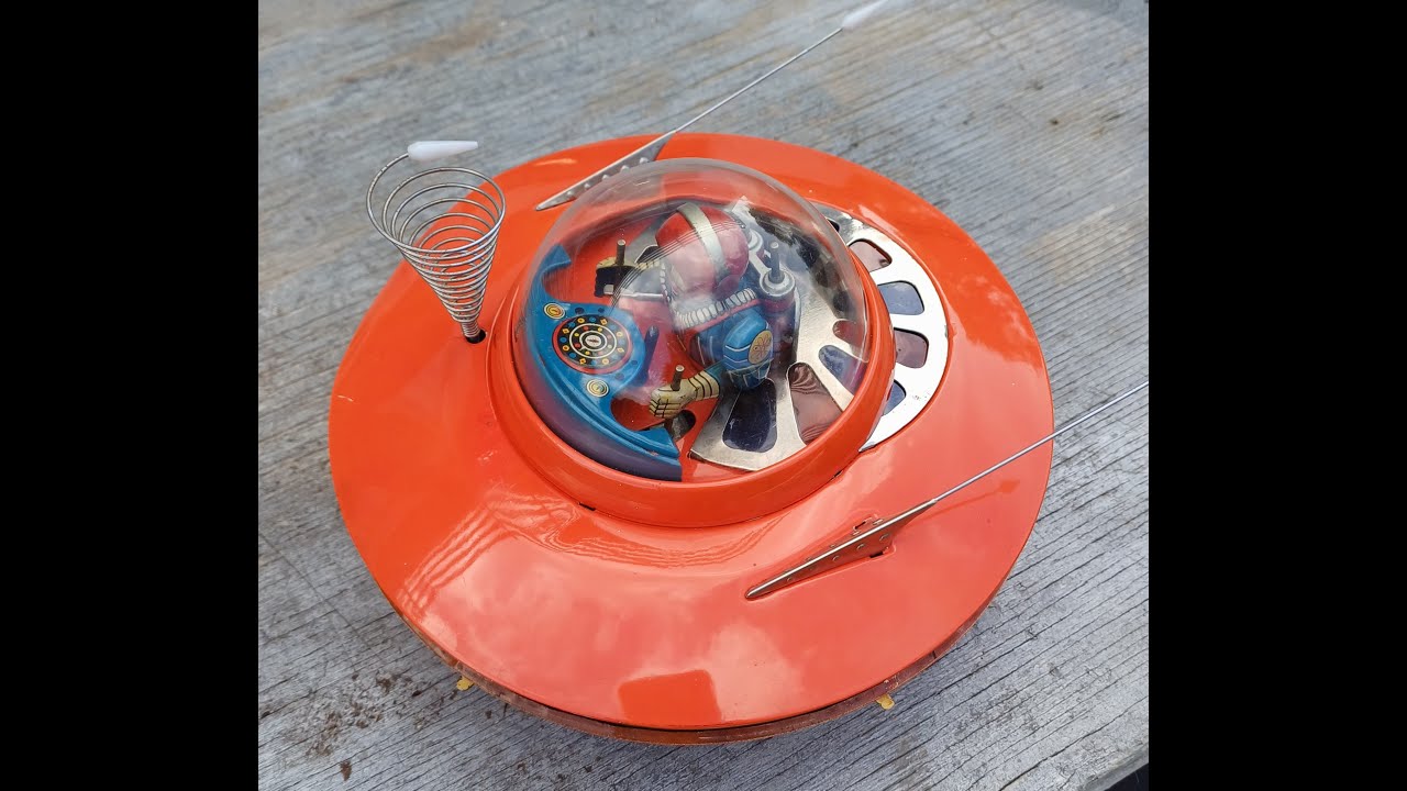 K.O. Yoshiya Flying Saucer with Space Pilot restoration. Tin toy robot Japan 1960's