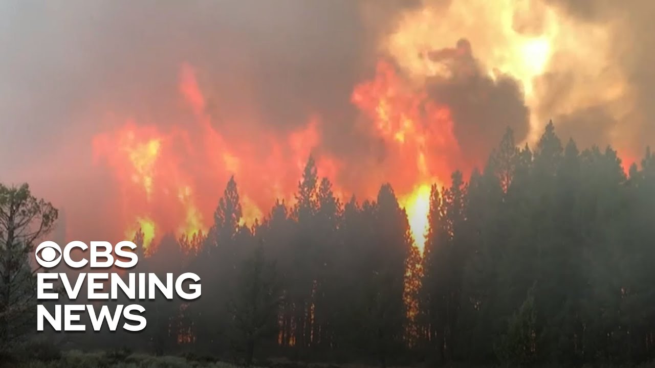 Dozens of raging wildfires scorch Western U.S.