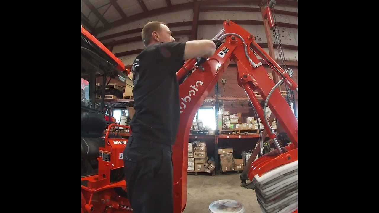 Adding a hydraulic valve onto a Kubota BH92  for the thumb