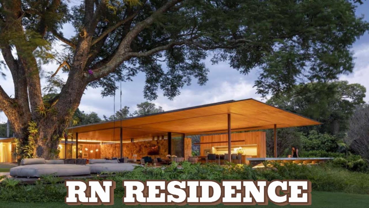 Vacation home in Brazil gains landscaping that integrates local vegetation into the new project