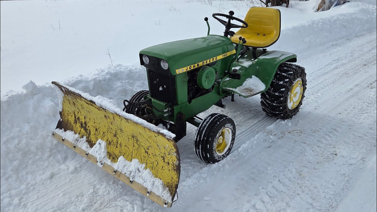 Snow plowing with John deere 140 H3 