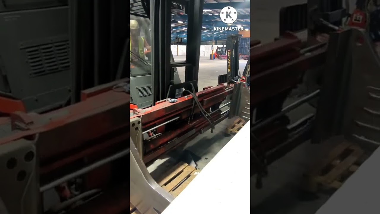 Linde H80 hose repair on a bale clamp.
