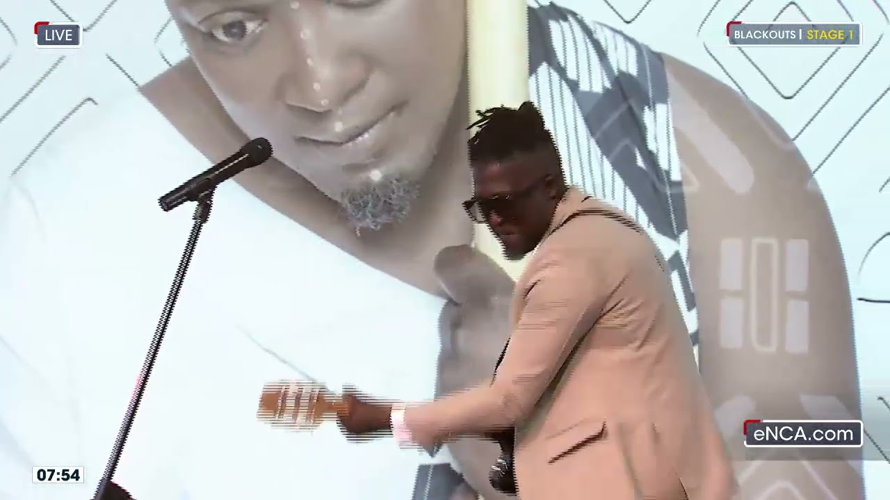 Sliq Angel performs in studio