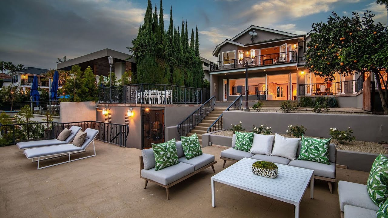 $6,495,000! Rare Toluca Lake waterfront home with stunning location and unobstructed water views