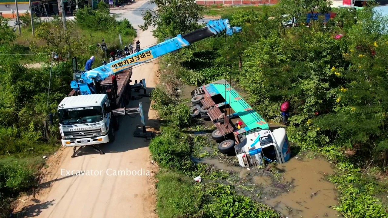 Be careful !! Dump Truck Accident In Canal Help Recovery By Skills Crane And ExcavatorCat320 success