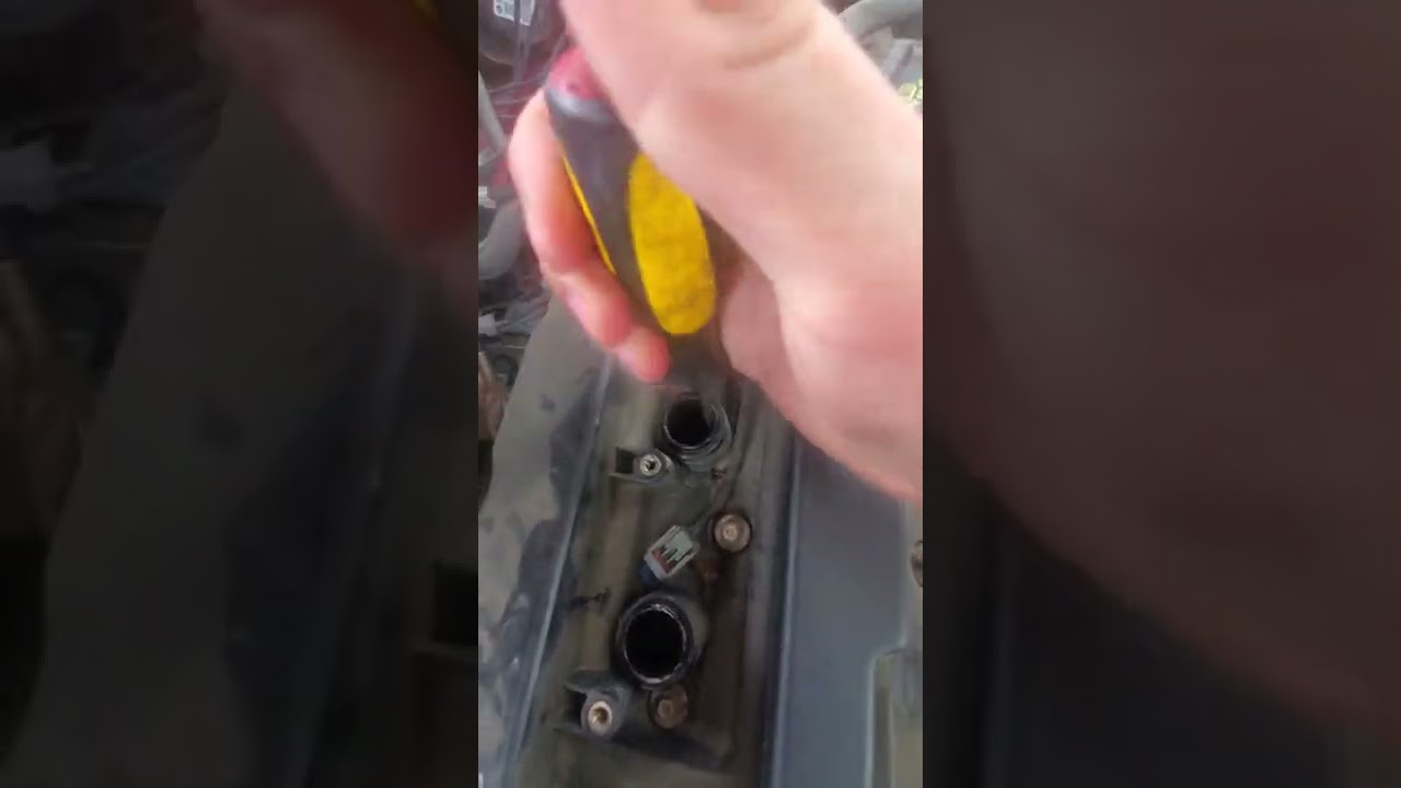 Ignition coil boot stuck on spark plug. An easy fix!