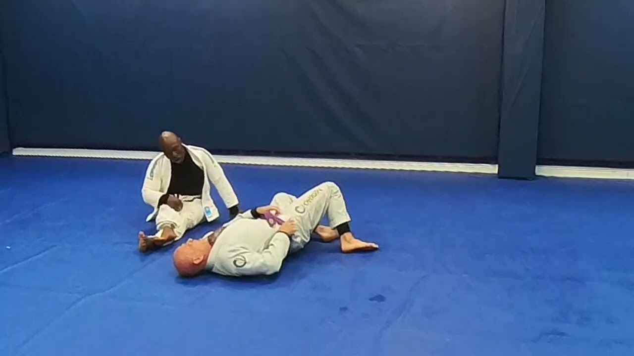 Roz and Peter Gi sparring