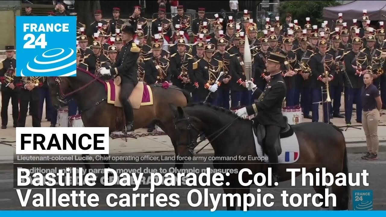 Bastille Day parade: Colonel Thibaut Vallette carries Olympic torch • FRANCE 24 English