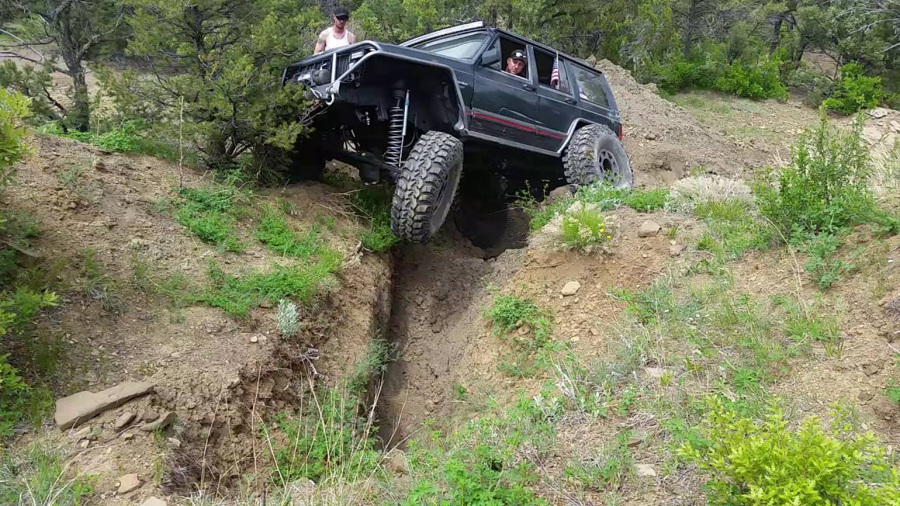 Xj on 42's getting swallowed up at Judgment Bowl Offroad Park