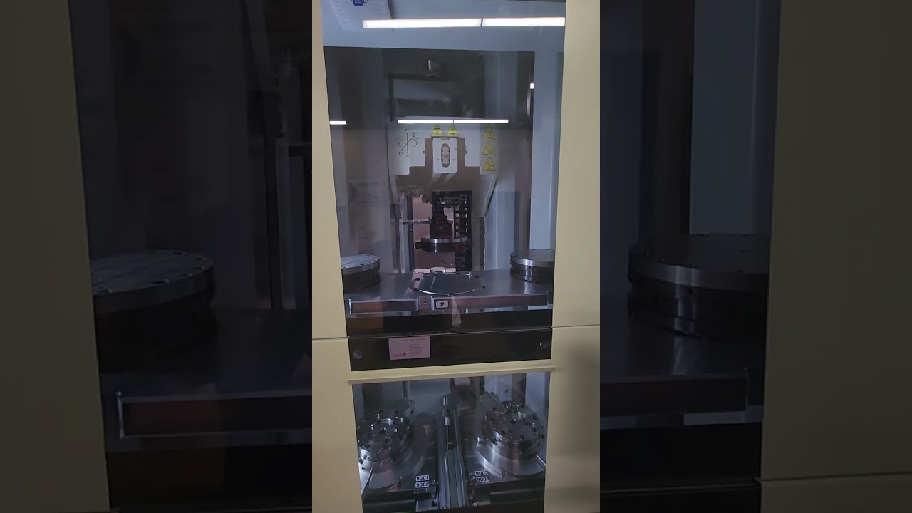 Erowa ERC80 loading an Okuma MU-4000V