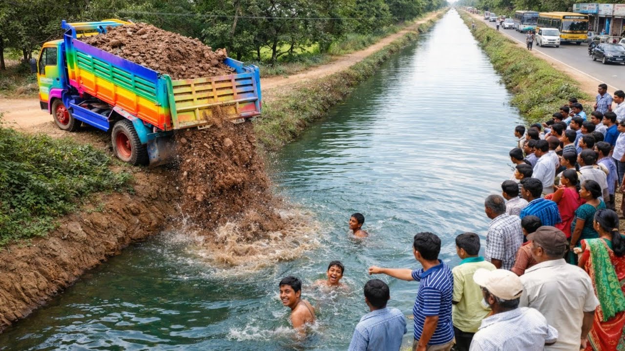New Successful Complete In The Water Project by dump truck unloading soil & skill bulldozer pushing