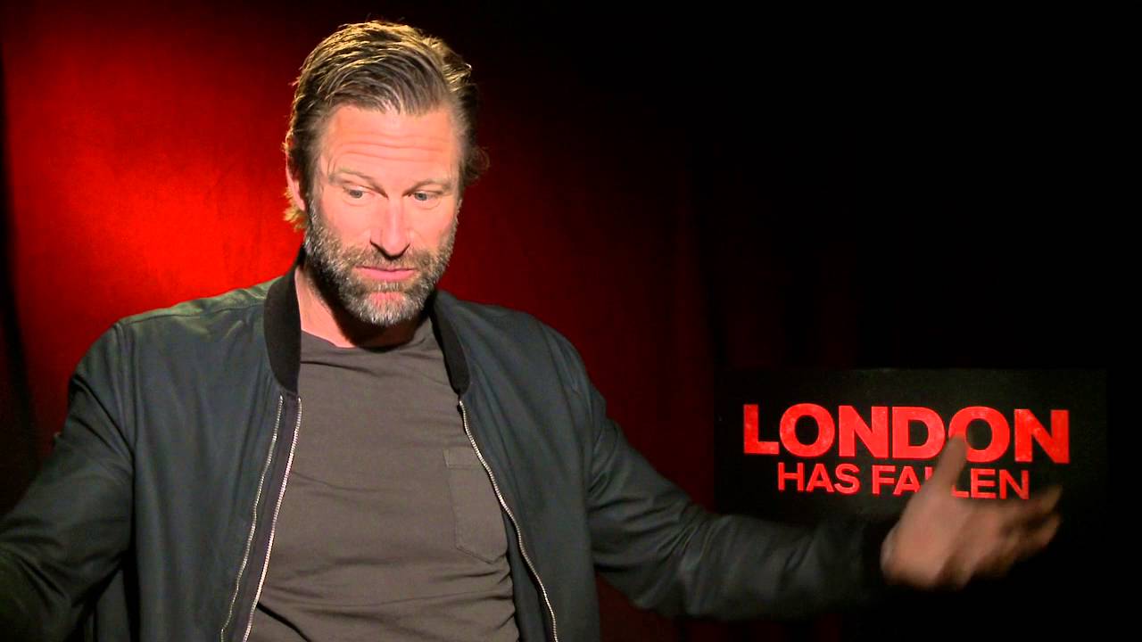 London Has Fallen: Aaron Eckhart Official Movie Interview | ScreenSlam