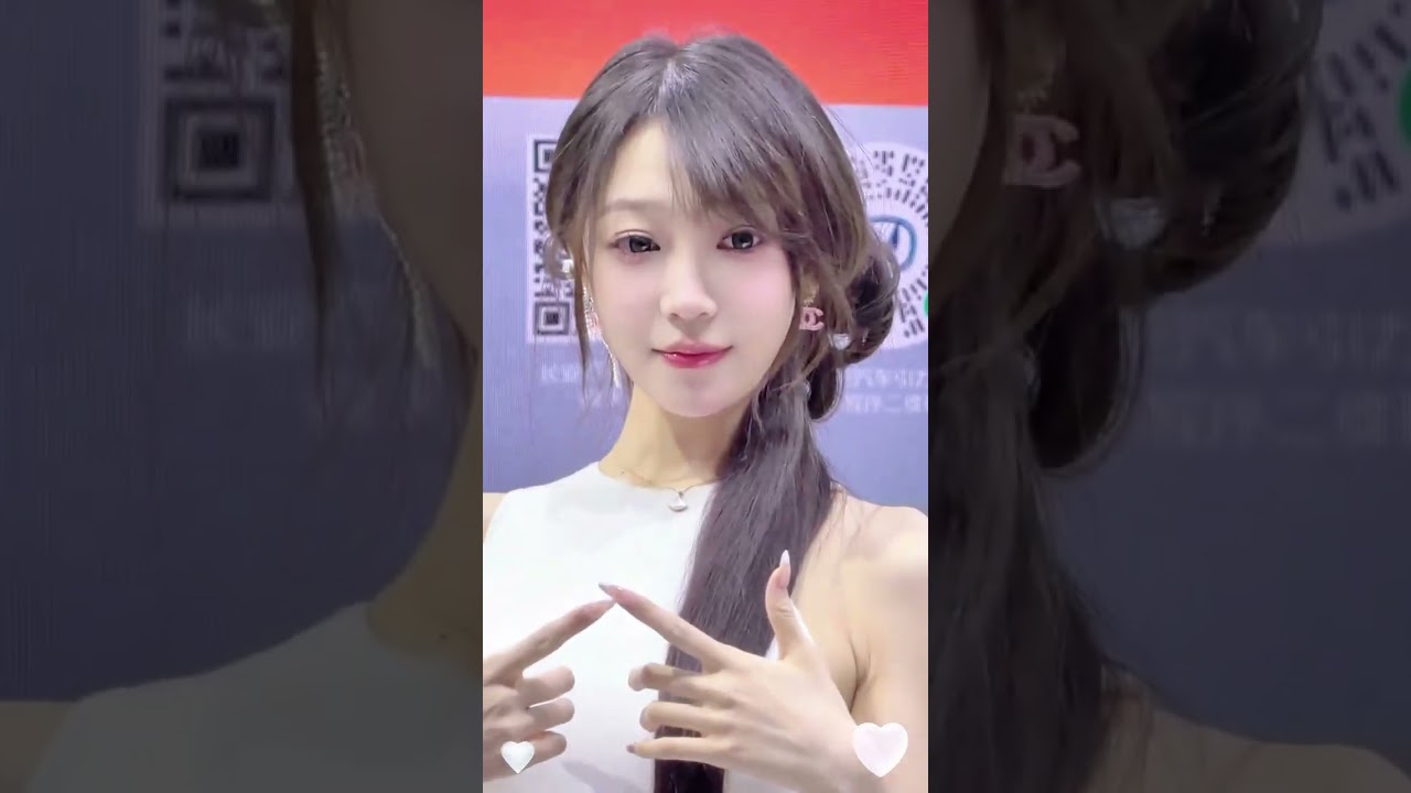 Yifei Liu at Changsha Auto Show: The Beauty and Sound of Guan Guan and Yu Jiu