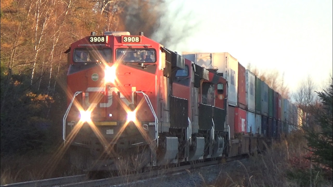Long Stack Train CN 120 passing Nappan, NS at Track Speed during Morning Golden Hour