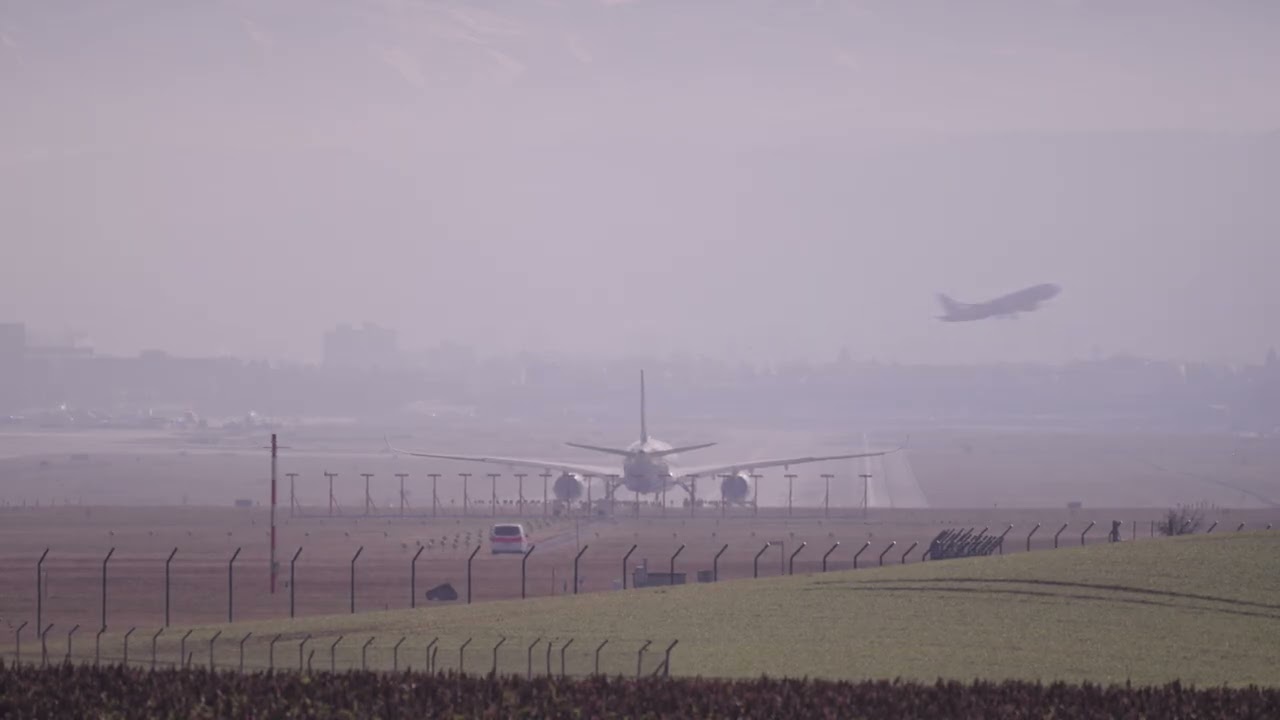 Zurich Airport Cathay Pacific airplane Airbus A350-941 B LRO taking off on a winter day.