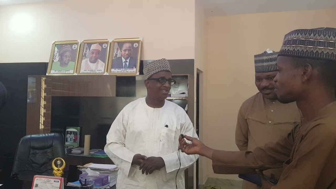 The CMD receiving humanitarian award from Fadama All Stars Social Club Katsina.