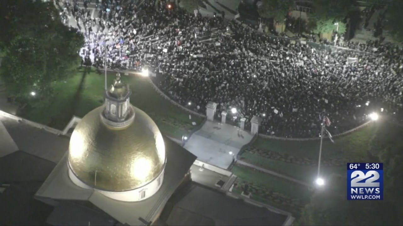 Boston cleans up after violence, looting from police protest