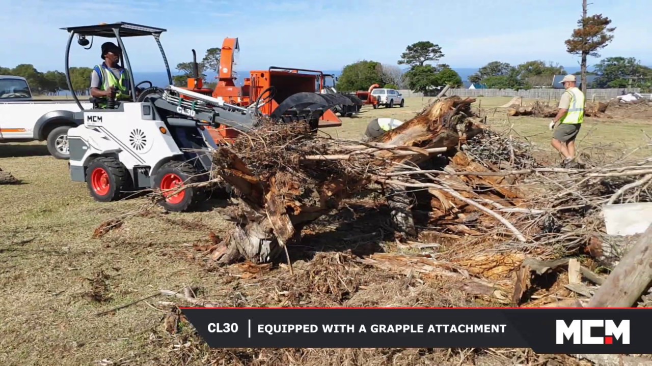 CL30 Compact Loader using Heavy-Duty Grapple Attachment To Get The Job Done Faster!