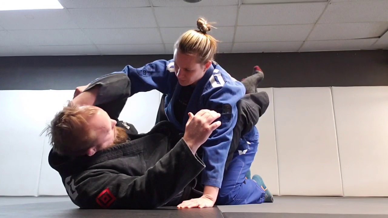 Punch defense (part 2) from closed guard with Justin Lough BJJ.