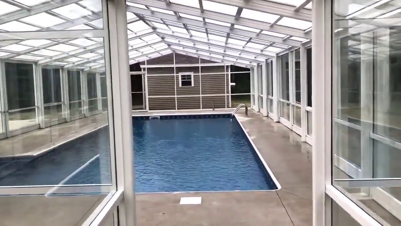 Roll-A-Cover's Retractable Pool Enclosure