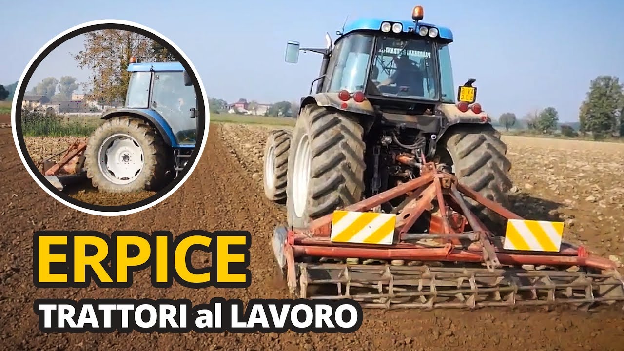 Grande trattore Landini al lavoro con erpice Moreni