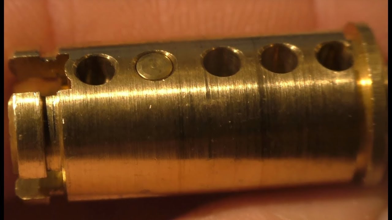 Budowa i składanie po wypatroszeniu wkładki Tesa Assa Abloy.