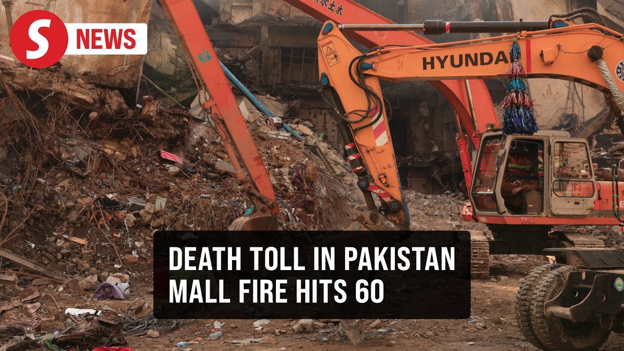 Death toll in Pakistan mall fire rises to 60 as dozens of bodies found