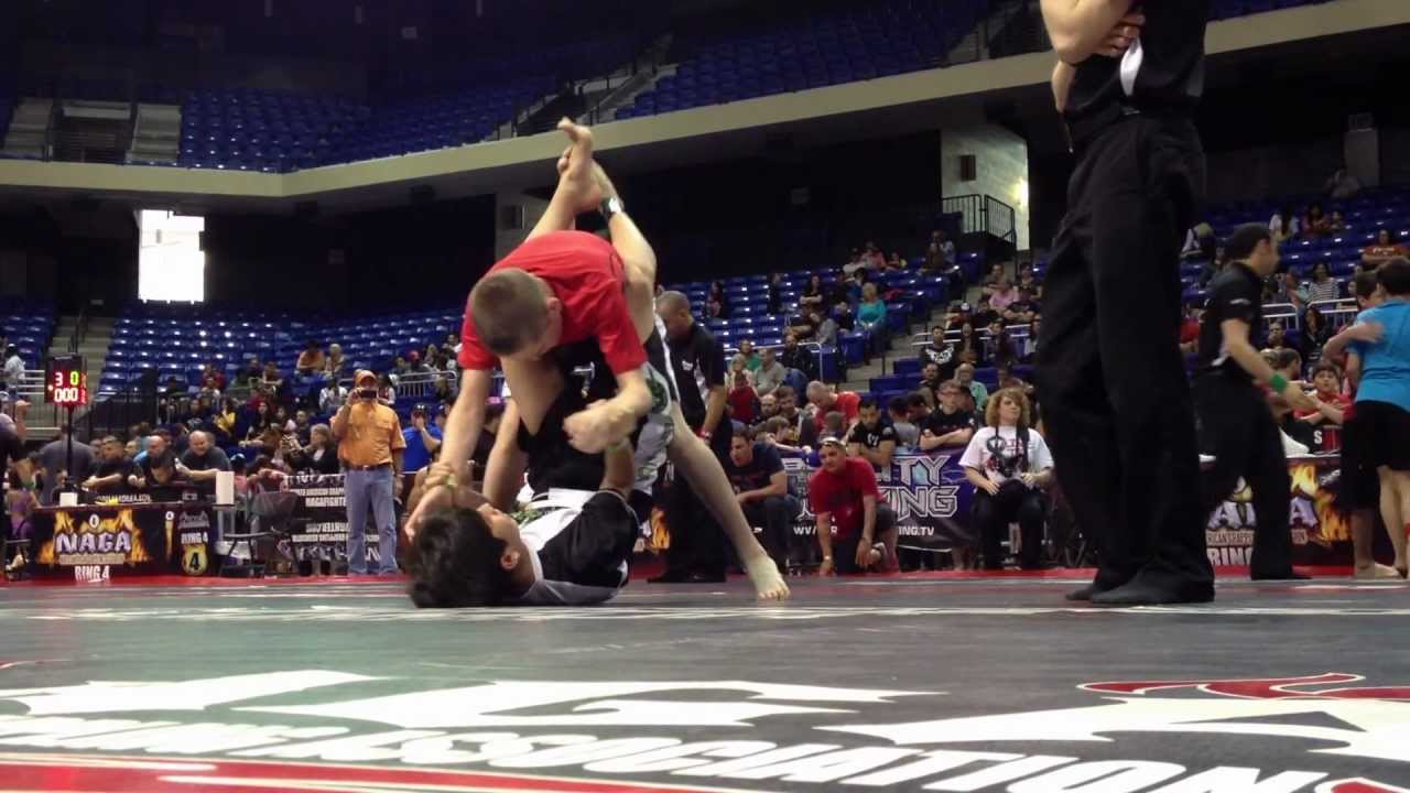 Sweet arm triangle submission victory - kid's BJJ, no-gi, 12 yr old, white belt, 80-90 lbs division