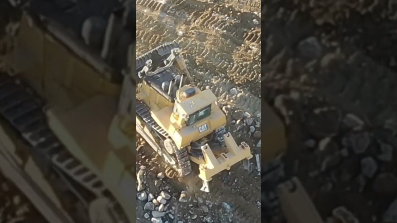 Cat 953K Track Loader traversing rough terrain #postmymachine
