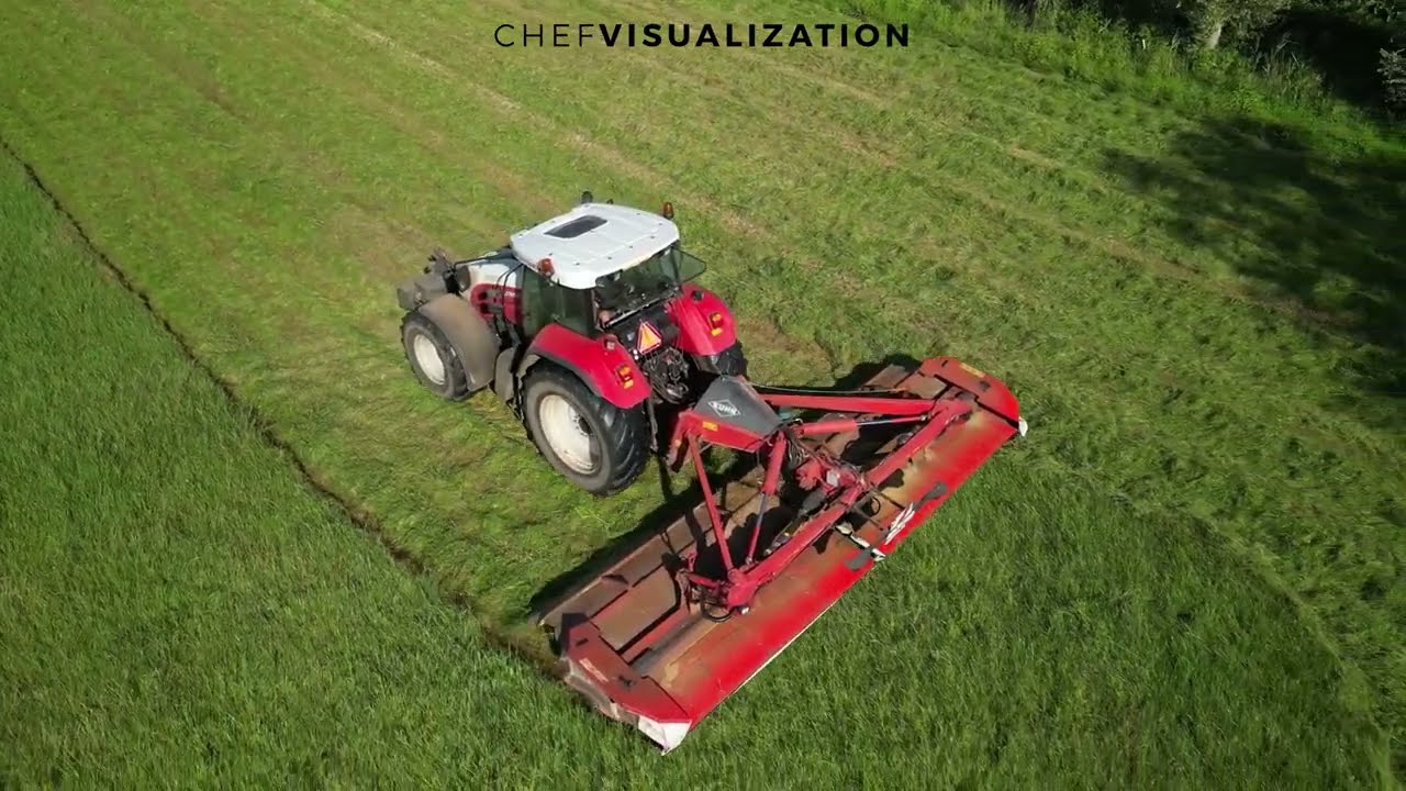 Biemans Loonwerk Erp, gras aan het maaien met een Steyr 6195 in combinatie met Kuhn FC703RA