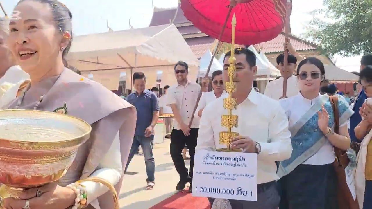 พิทียกยอดชอฟ้าพัดสิมมาวัดร่องไก่แก้ว