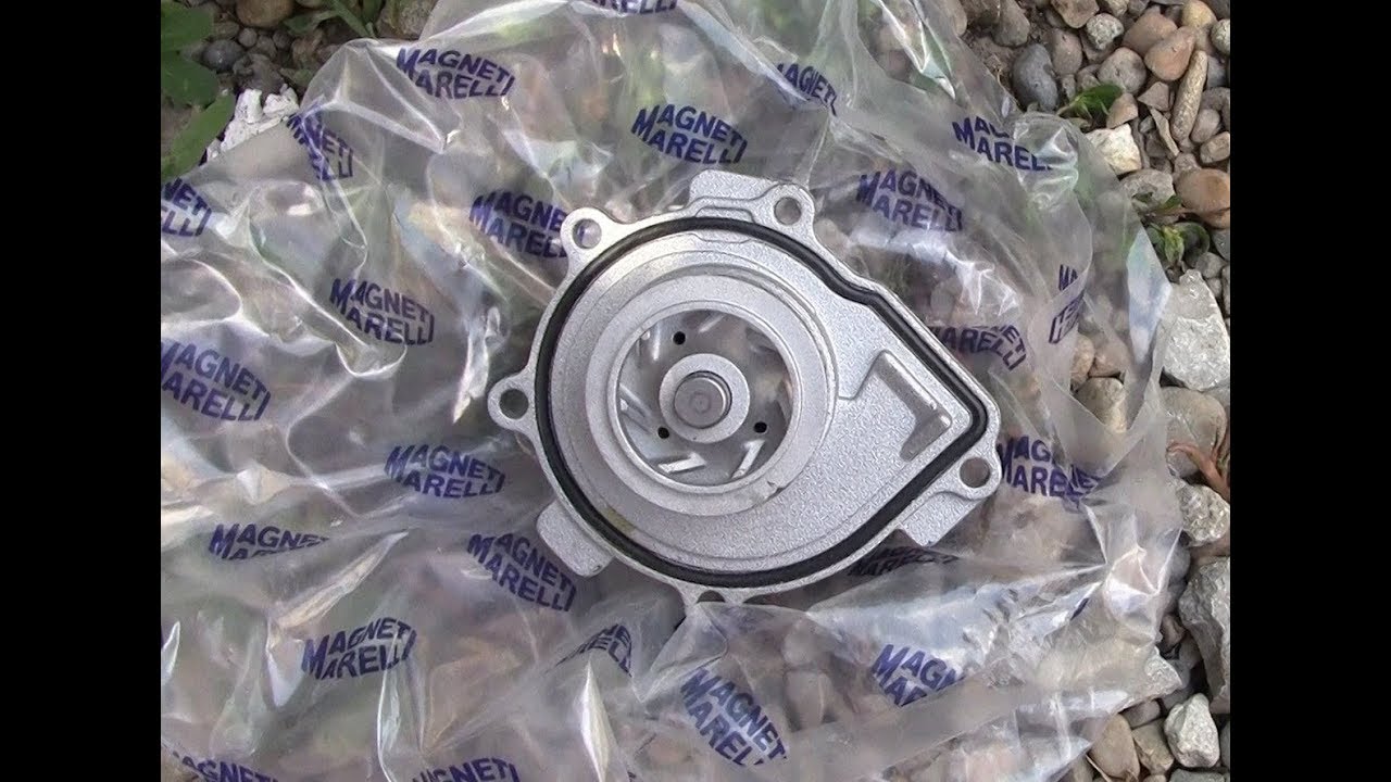 Замена помпы  Opel astra H