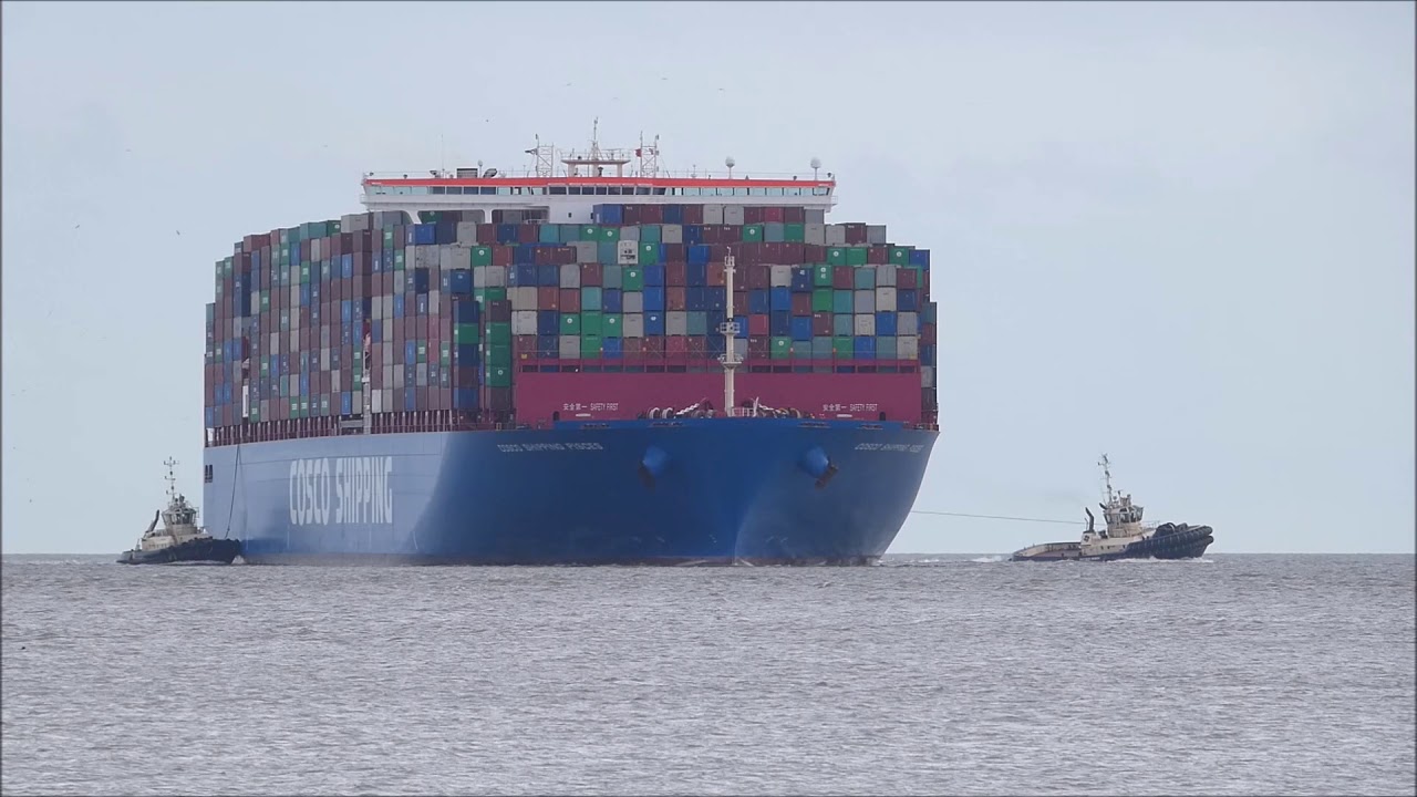 Heavily laden Cosco Shipping Pisces swings port with 3 tugs for Felixstowe 9  25th February 2020