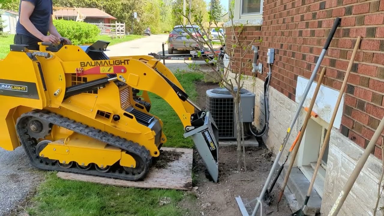 Baumalight Mini Skidsteer with Tree Scoop