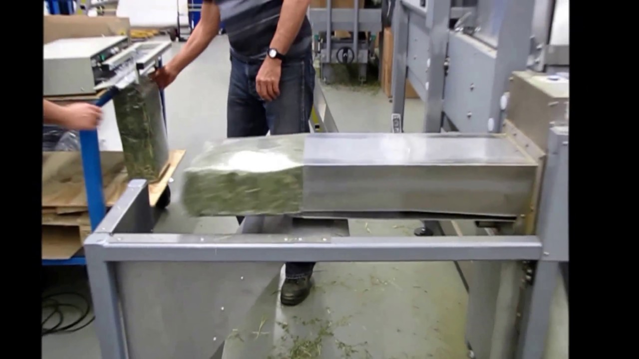 Halbautomatische Verpackungsmaschine  f&uuml;r Heu