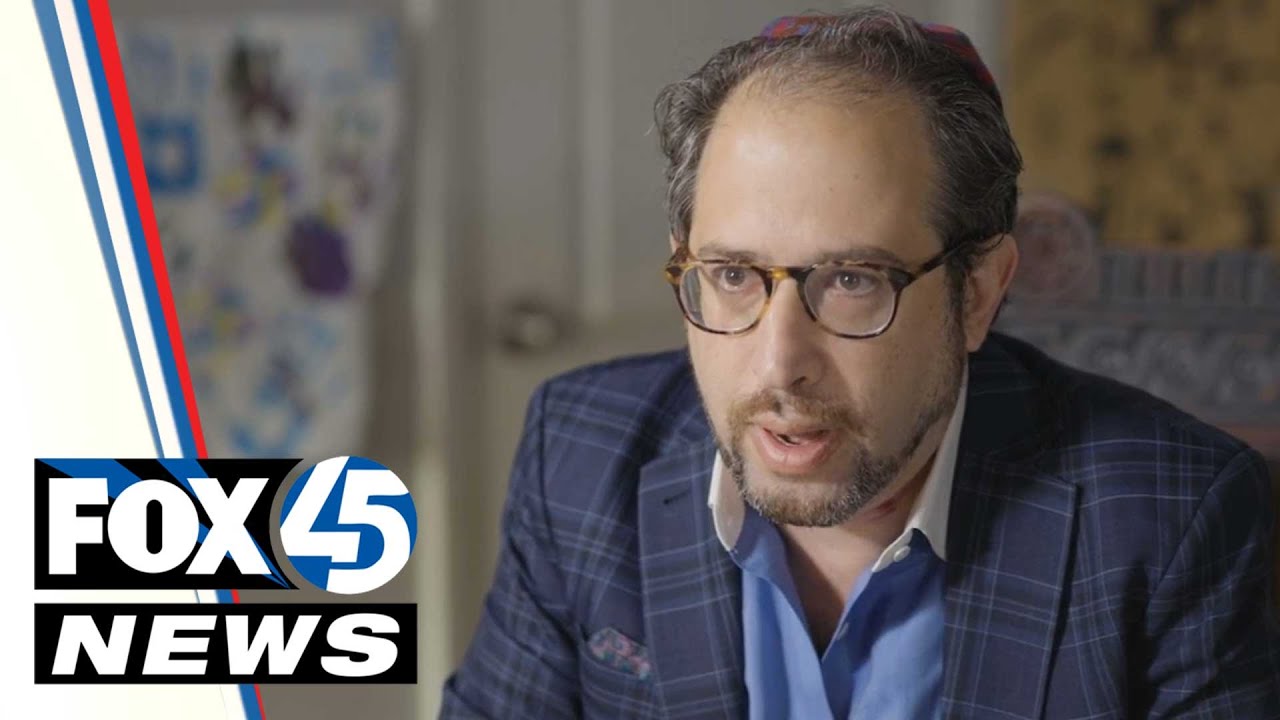 Baltimore teacher says he was fired after calling Child Protective Services