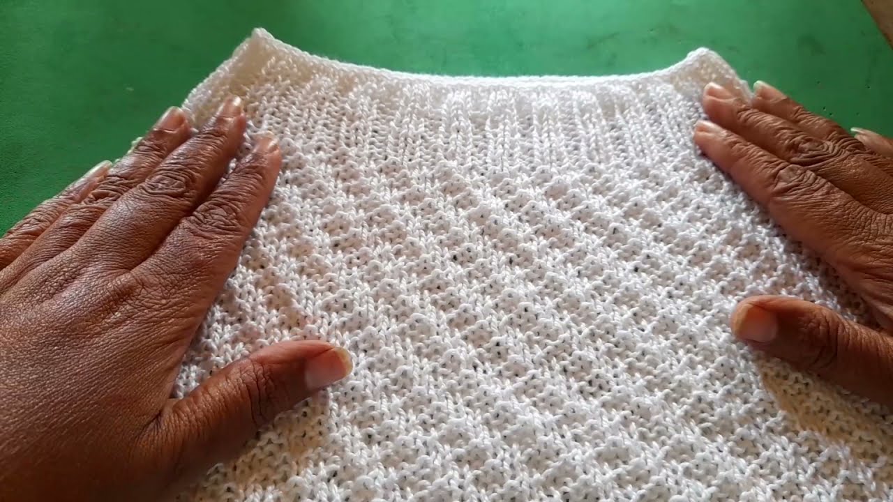 ponto da blusa tricô verão com gola alta.