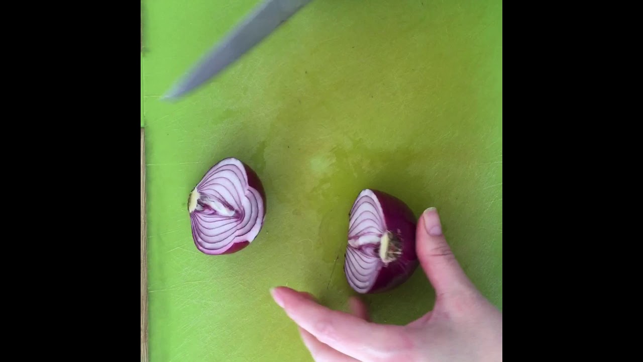 cutting an onion into wedges