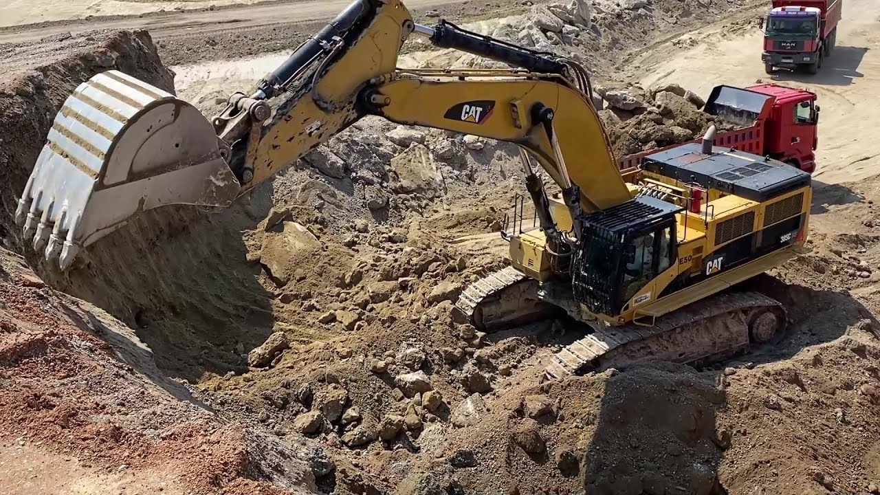 Caterpillar 385C Excavator Loading Mercedes & MAN Trucks - Interkat SA