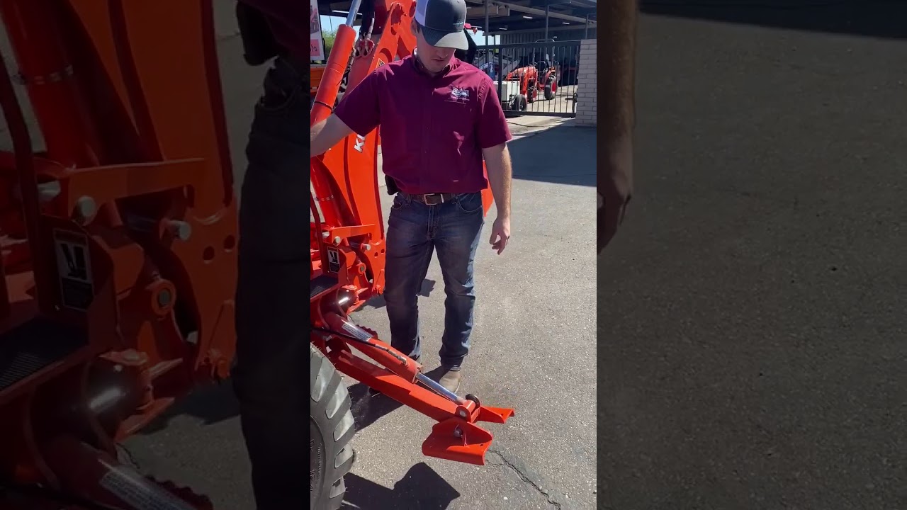 Showing me how to attach/detach my BH77 backhoe implement for my Kubota B2650(1)