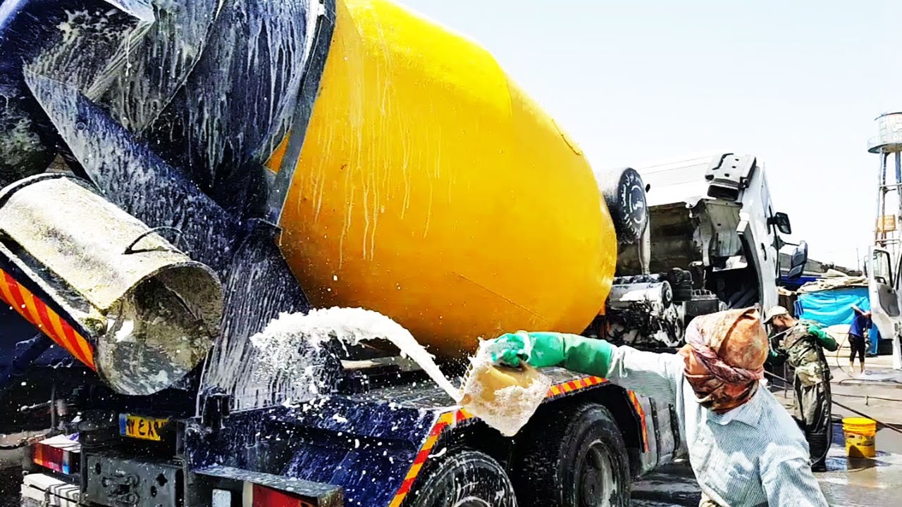Truck washing: using ACID to remove cement  tough process washing muddy concrete truck!