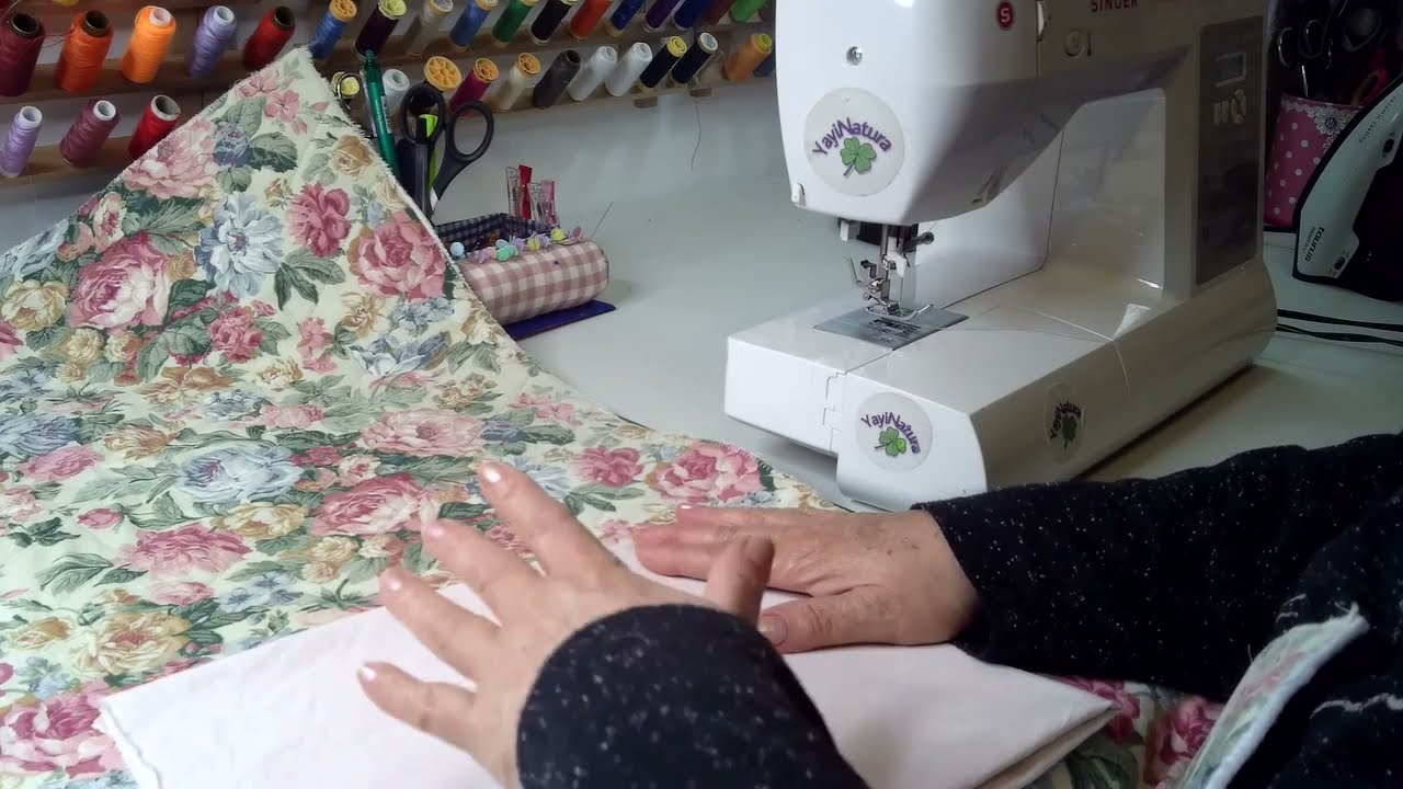 Tapete para máquina de coser con bolsillos