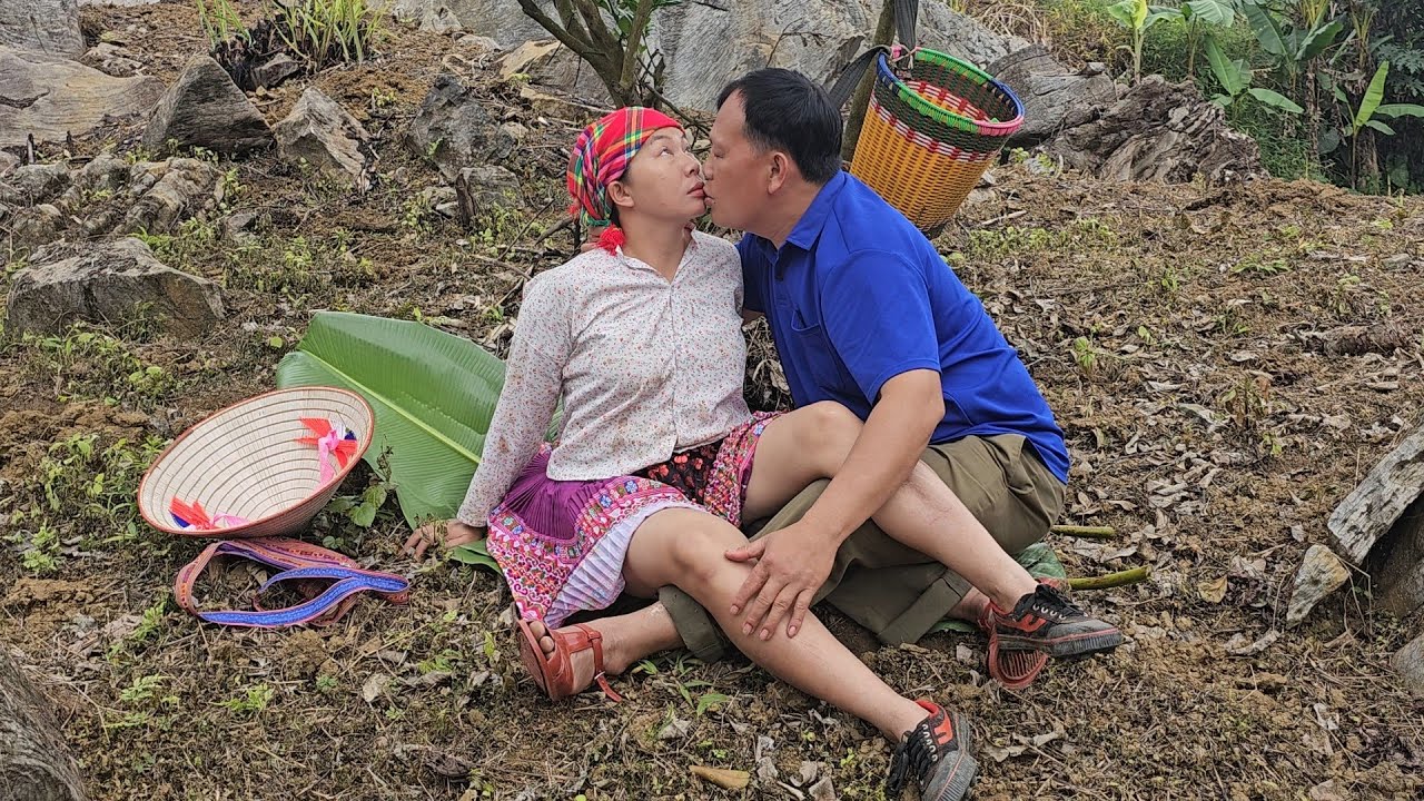 Ly Thi Mai, a young girl, herds cattle and collects ant eggs to eat.
