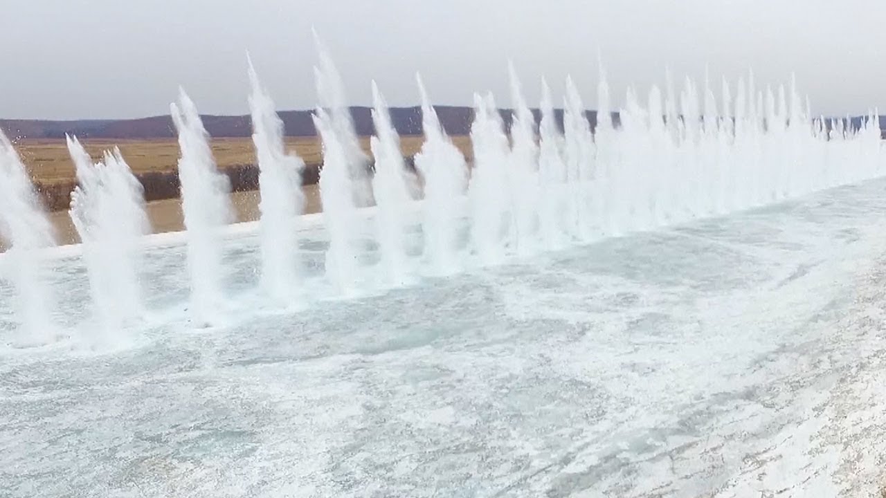 Frozen river blasted to prevent ice blockages in NE China
