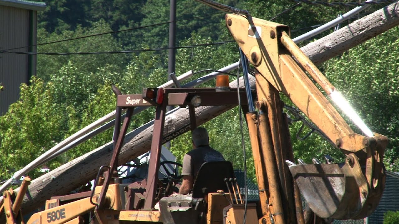 Backhoe Snapped Power Pole Operator Is Trapped Under Live Lines Fife WA