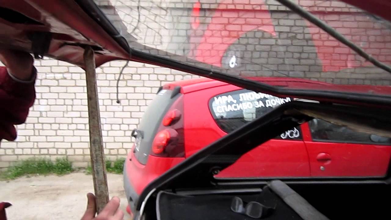 как вставить заднее стекло на таврию.