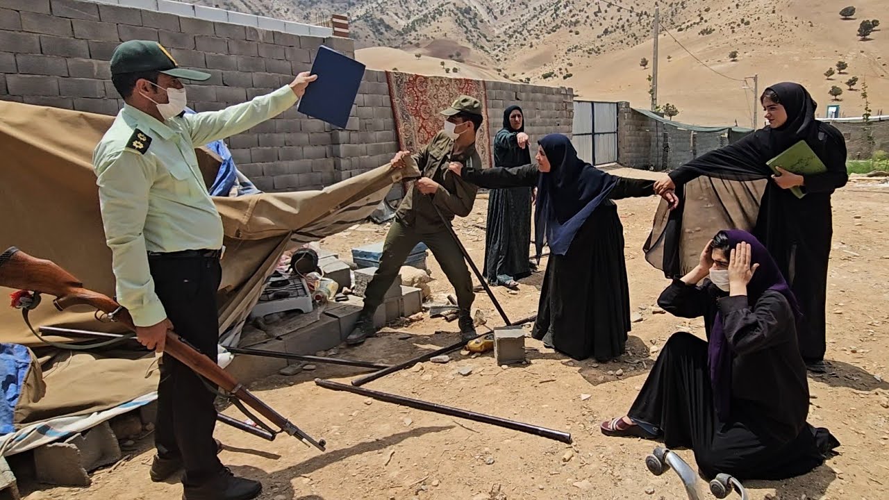 Police clash and second woman's veil thrown out