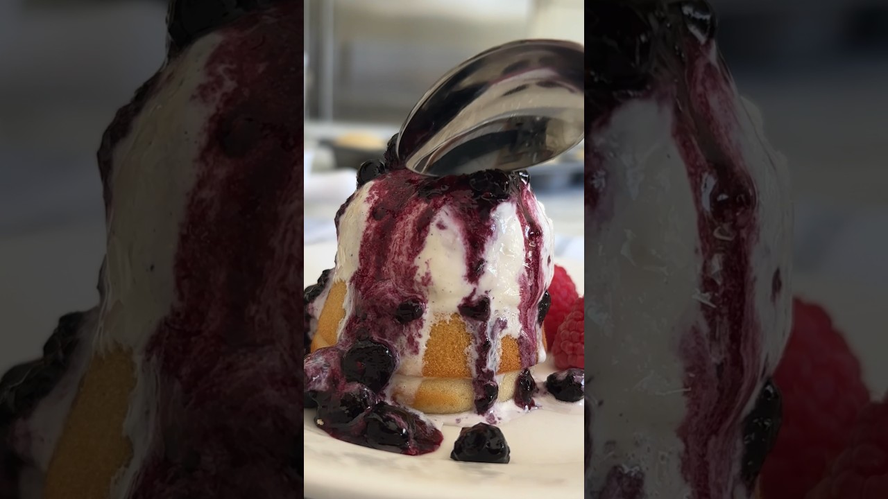 Mini almond butter cakes, served warm with a scoop of ice cream and a drizzle of warm berry compote