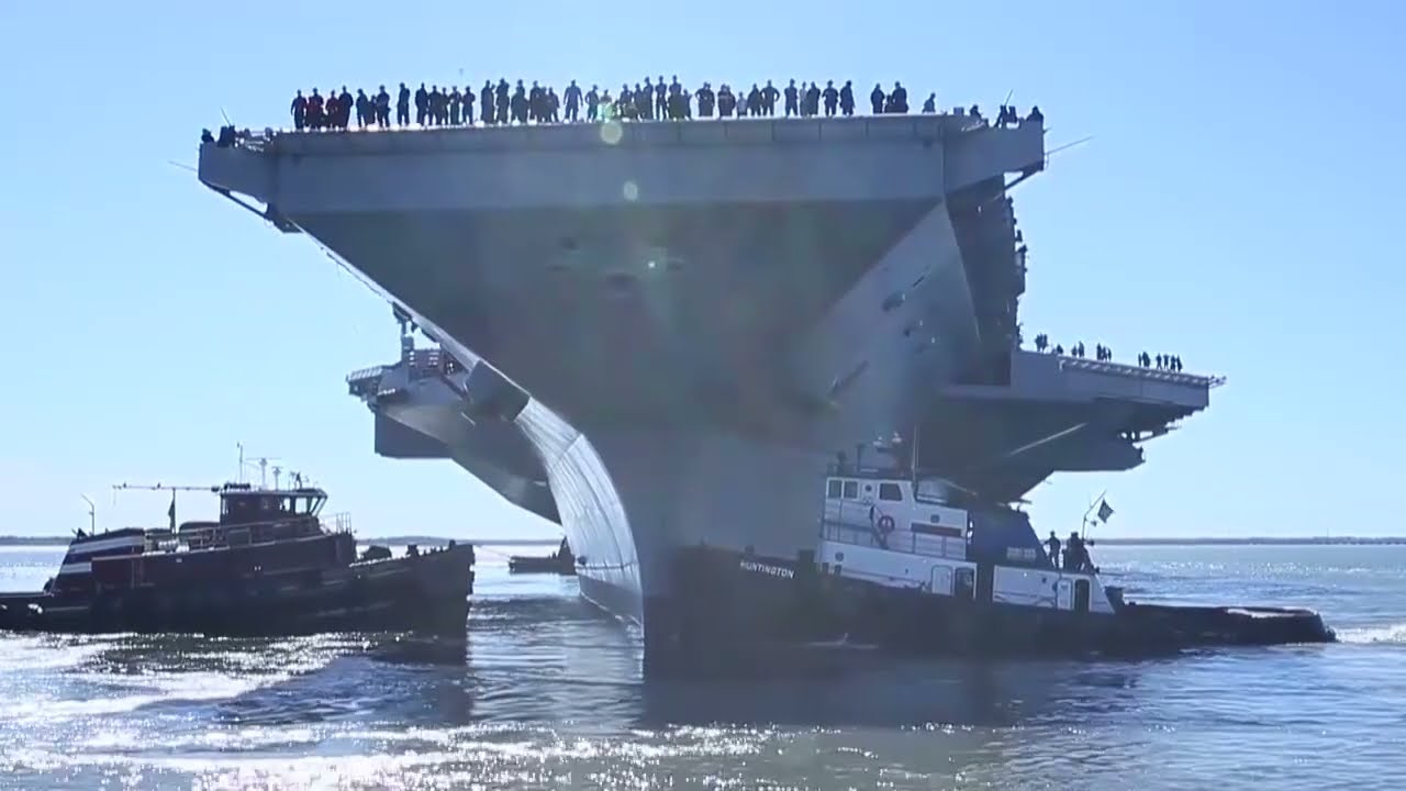 USS Gerald R. Ford (CVN 78) departs the shipyard.